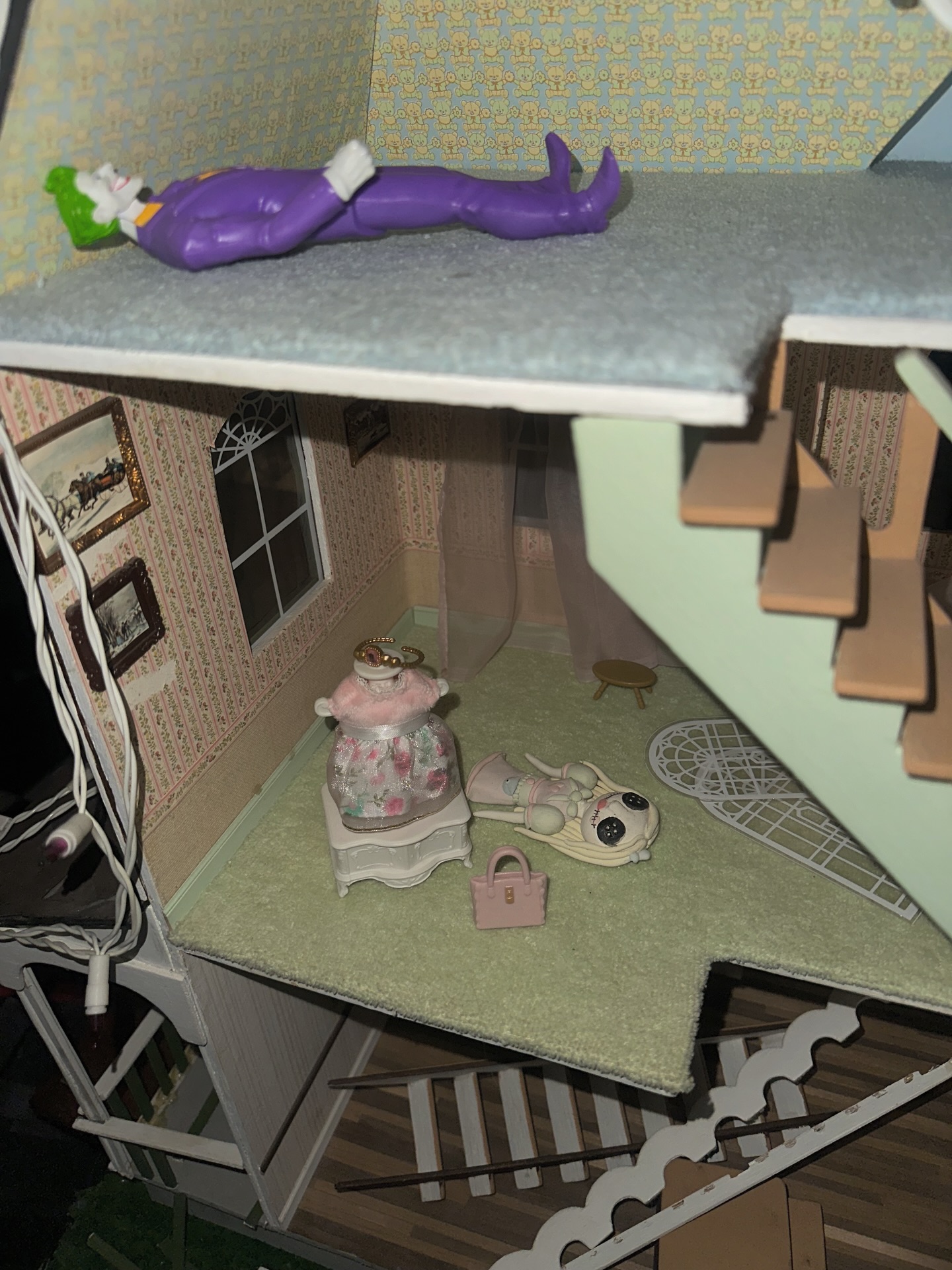 Dollhouse scene with figurines