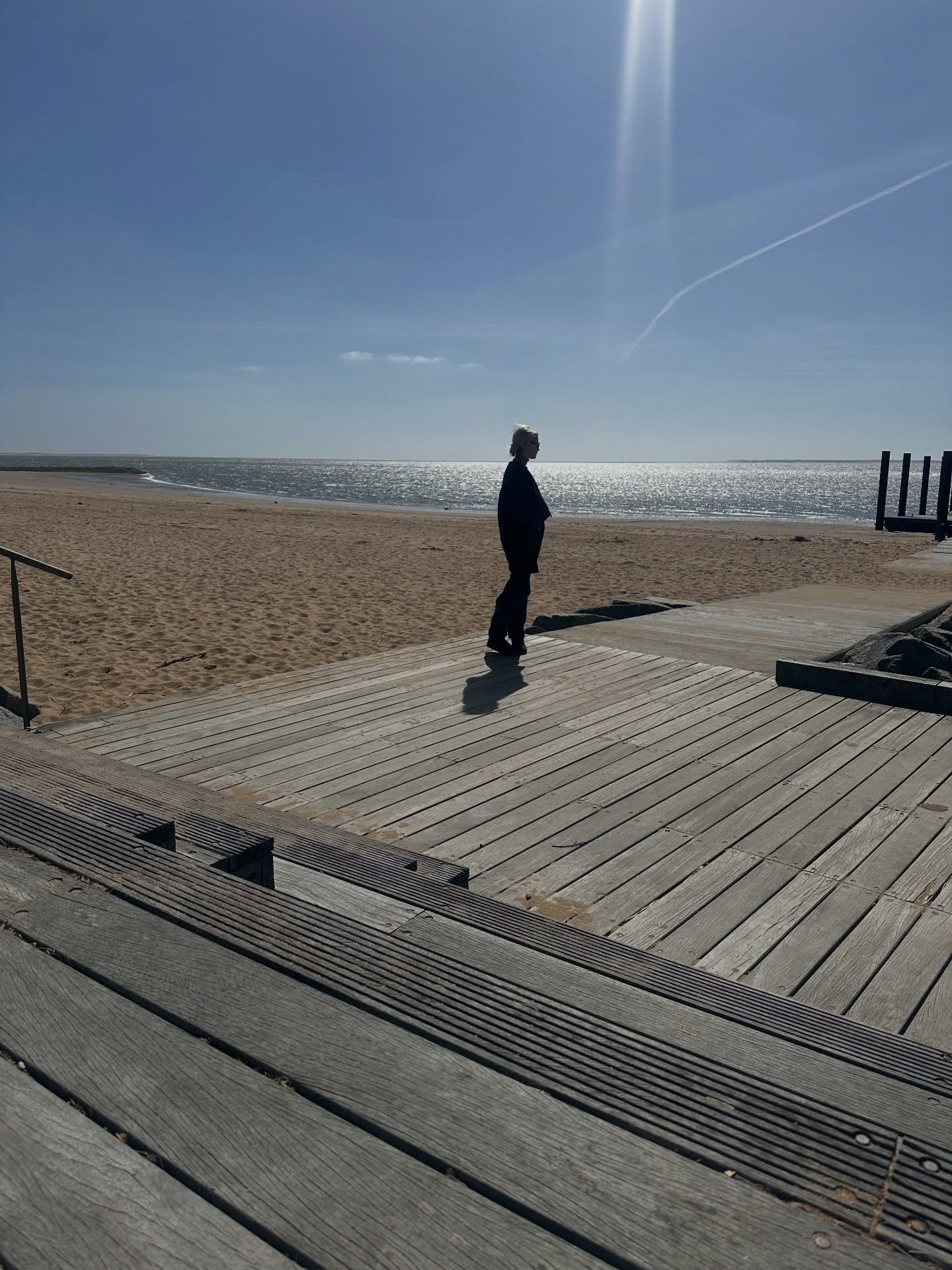 Seaside boardwalk at golden hour